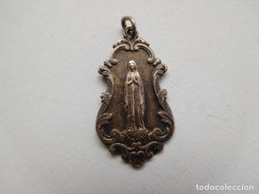 Antiguidades: Medalla antigua de plata virgen
